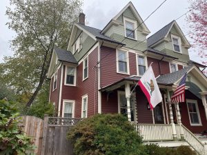 Pennsylvania Victorian home with siding replacement and lush greenery