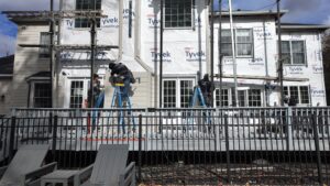 The home exterior renovation experts at Kesting Construction installing energy-efficient siding on a Pennsylvania home.