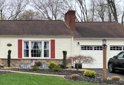 Siding and roofing work on a residential home in Yardley, PA, showcasing Kesting Construction's exte.