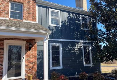 Siding installation by Kesting Construction in Hatfield, PA, showcasing durable blue siding on a res.