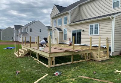 Custom backyard deck construction by Kesting Construction in Collegeville, PA. Expert craftsmanship.