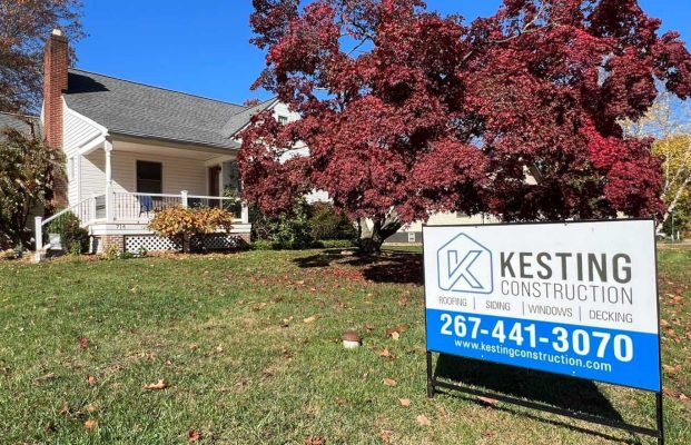 Kesting Construction yard sign with contact info and logo.